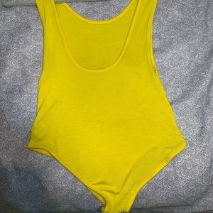 Bright yellow bodysuit